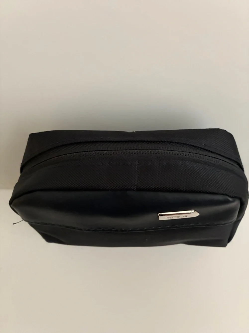 Tumi Black Men's Toiletry Pouch with Gold Accent